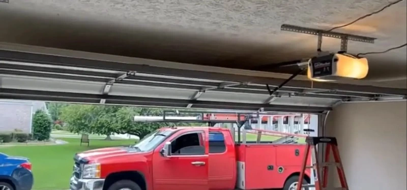 Residential garage door properly aligned on its track after repair in Myrtle Beach