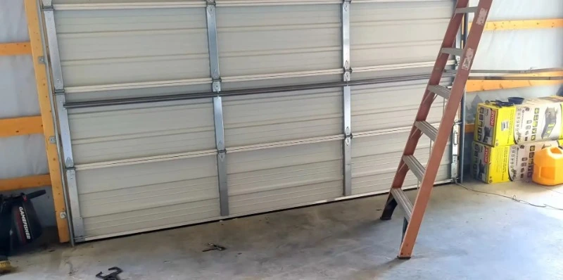 Replacement garage door panel installed on a residential garage in Myrtle Beach