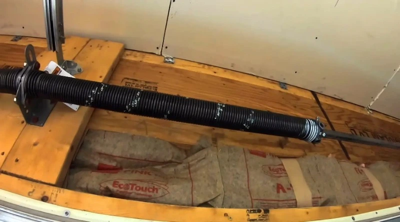 New torsion spring installed on a residential garage door in Myrtle Beach